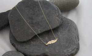 Gold Floating Feather Necklace