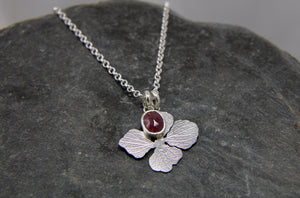 Beyond the Bloom Flower and Ruby gemstone Pendant