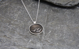 Soaring High Against Dark Clouds Necklace