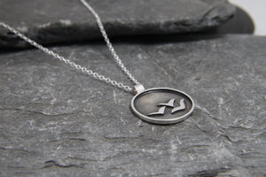 Soaring High Against Dark Clouds Necklace